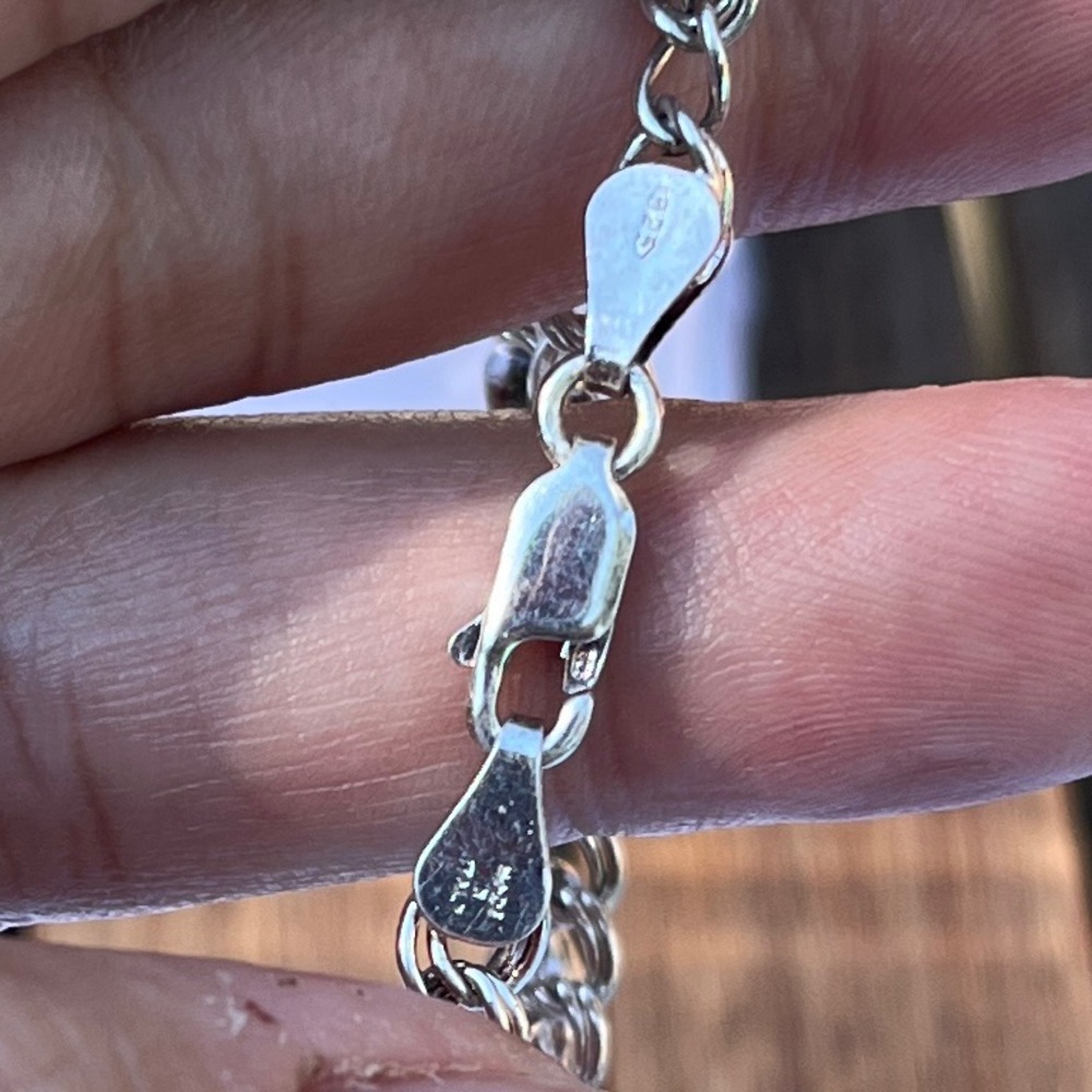 Charming Silver Bracelet with Playful Charms - Picture 9 of 9